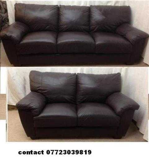 very good condition dark brown black leather 32 seater sofas