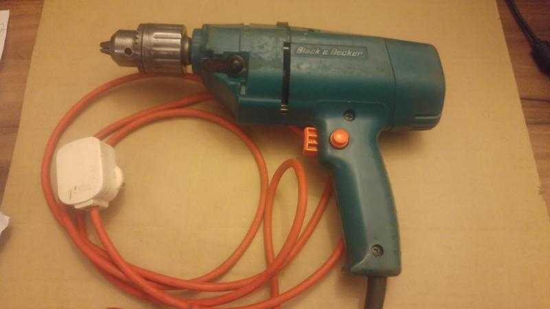 VINTAGE BLACK AND DECKER DRILL. VARIABLE SPEED WITH HAMMER ACTION.