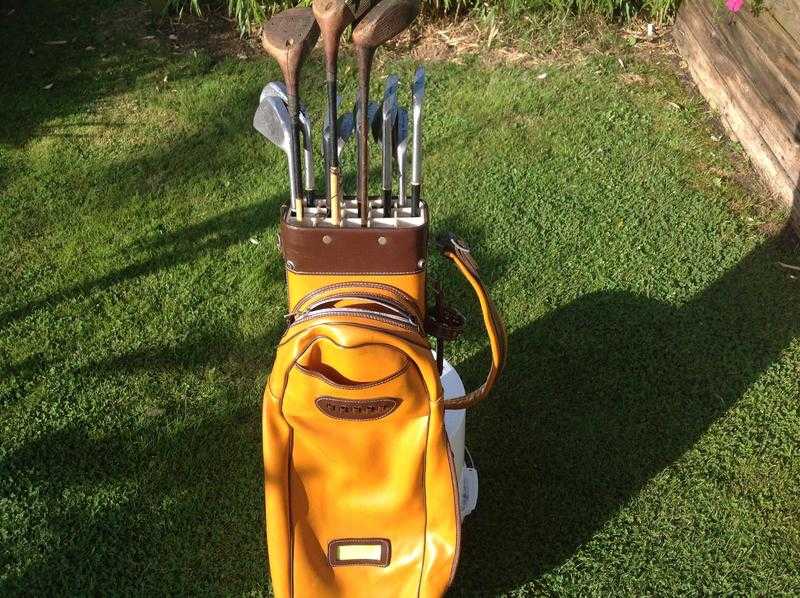 Vintage set of golf clubs with bag