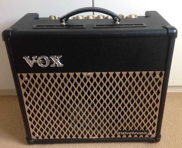Vox VT30 Valvetronic Amp with custom faux leather cover and power cord.