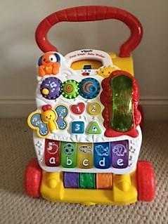 VTech Baby First Steps Walker and activity centre.