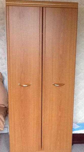 Wardrobe for sale.. Good condition. Teak effect.Bargain at 25