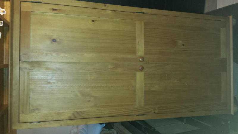 Wardrobe solid pine, double.  2 doors, 1 shelf, 1 hanging rail, can deliver locally for a small fee