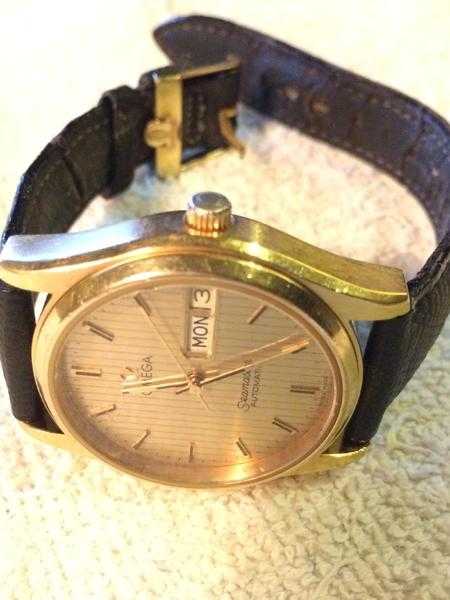 Watches Omega Seamaster self winding Automatic It shows the date and day  Omega Swiss