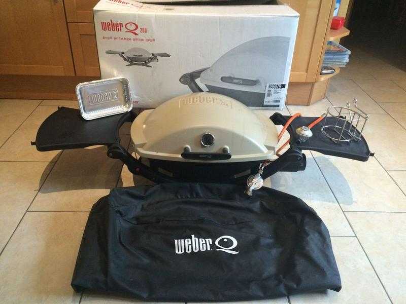 Weber Q200 gas grill with accessories