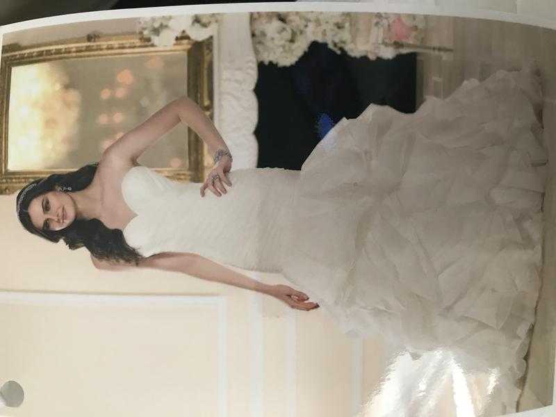 Wedding dress by Stella York
