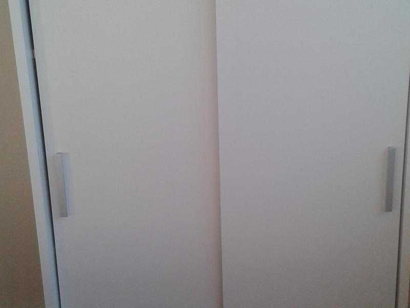 White 2 sliding door cupboard