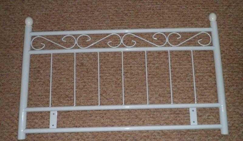 white metal single headboard