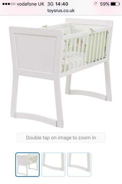 White rocking crib with mattress