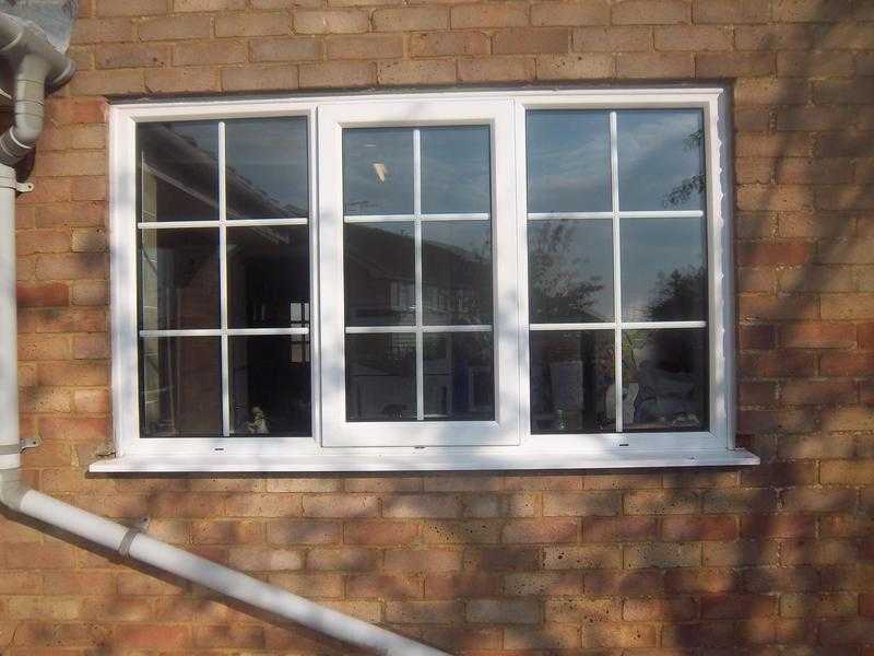 White upvc double glazed window georgian bar