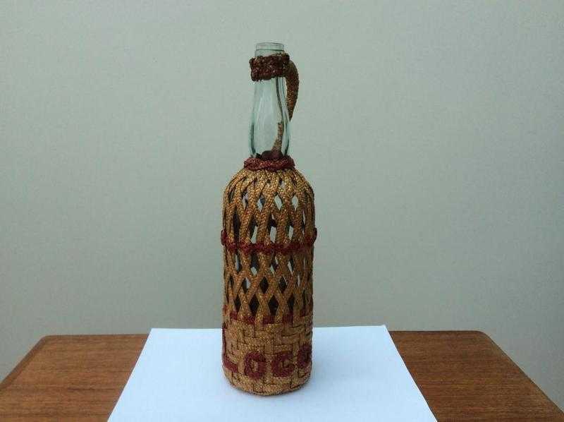 Wicker covered bottle.