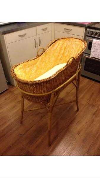 Wicker Moses basket (crib) and stand. In amazing condition. Comes with stand,lining and mattress