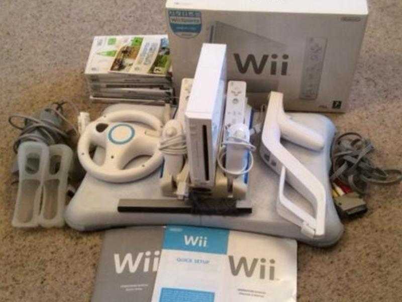 Wii (boxed with all instructions) amp Wii fit balance board bundle