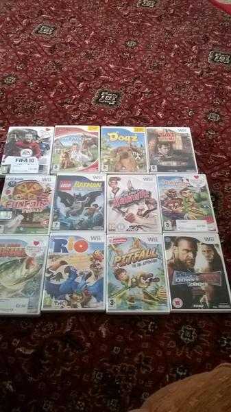 wii console and 12 games 25