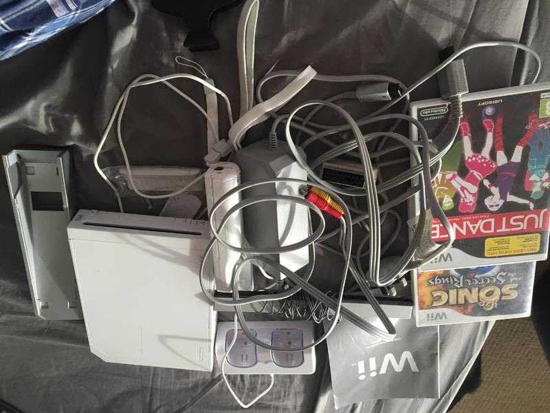 Wii console with controller and games