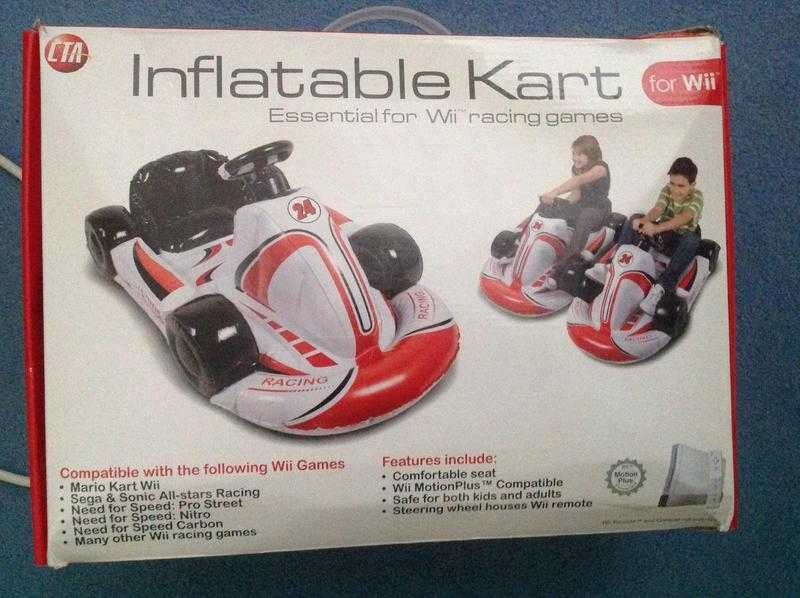 Wii inflatable racing car to use with Mario cart in good condition. Boxed in original box