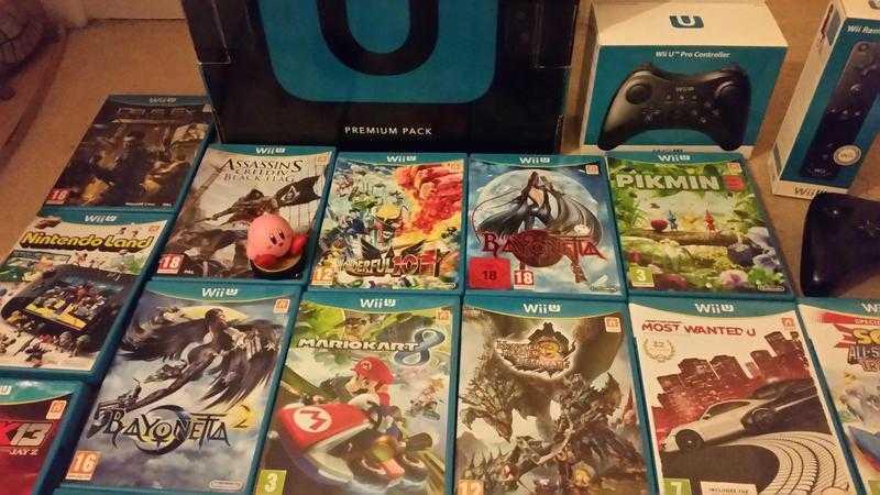 Wii U fully boxed with 18 games, 2 remote plus, pro controller and Kirby amiibo