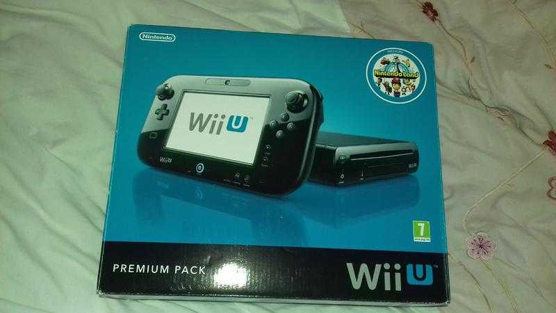 wii u plus games and 2 controllers