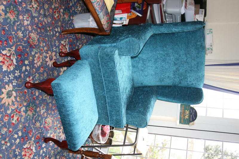 Winged armchair and footstool