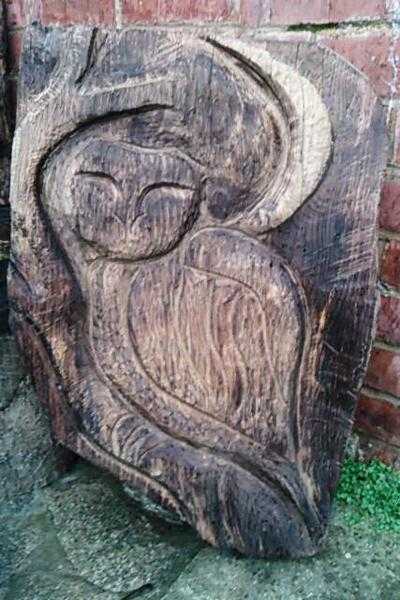 Wood owl for the garden