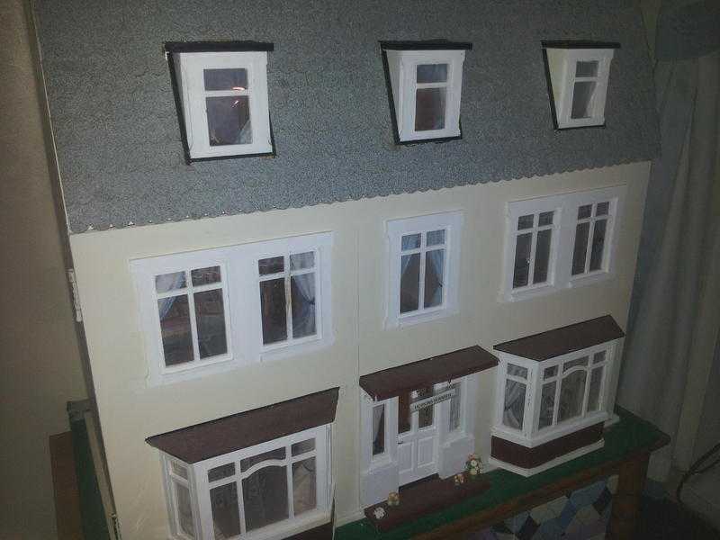 wooden doll house with accessories