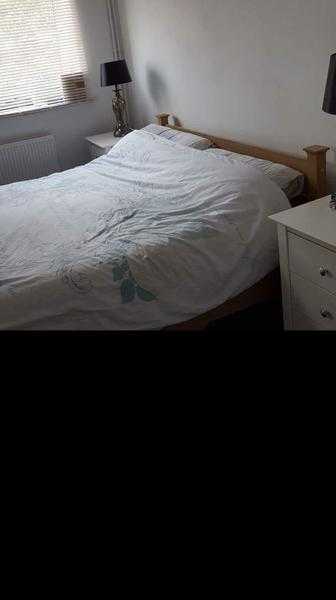 Wooden double bed frame