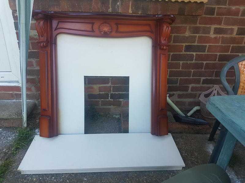 Wooden fireplace surround with marble back and hearth plus brand new fittings