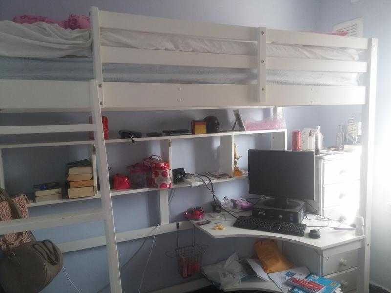 Wooden high sleeper bed with desk and shelving unit. Includes mattress