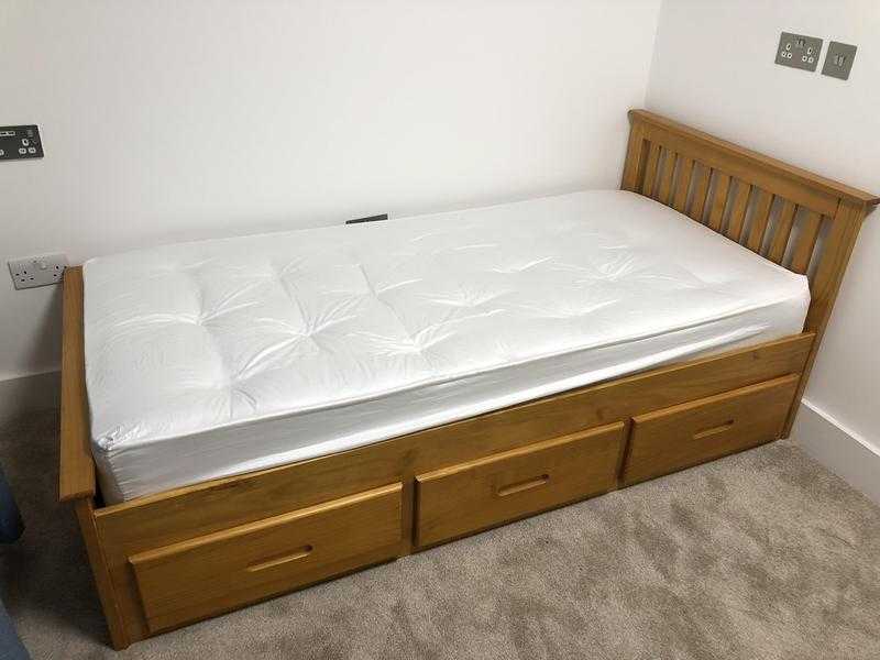 Wooden oak single bed with three drawer