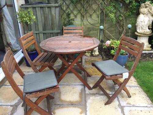 Wooden patio table and 4 chairs