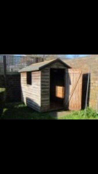 Wooden shed and base