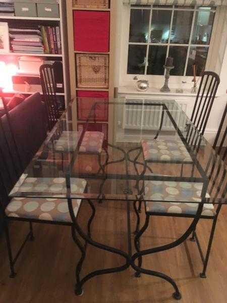 Wrought Iron dining room table and chairs