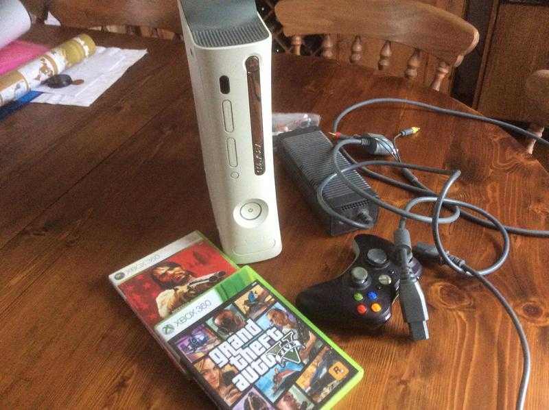 X box 360 console with games