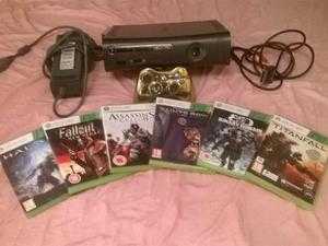 xbox 360 and 6 games wireless controller and battery pack and charger