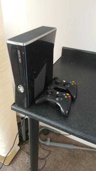 Xbox 360 for sale with 19 games installed on hard drive