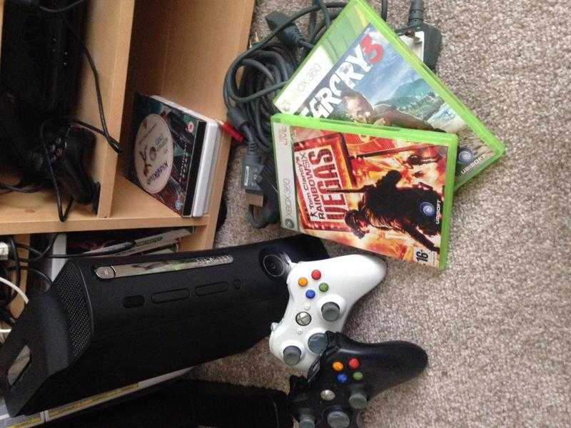 XBOX 360 includes two wireless remotes and two games