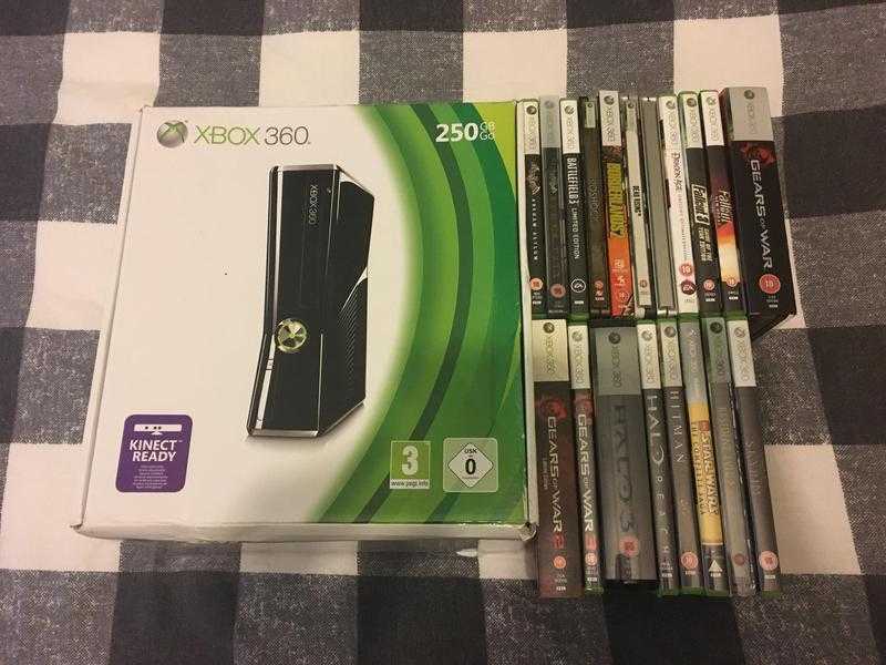 Xbox 360 slim 250GB boxed with 28 games
