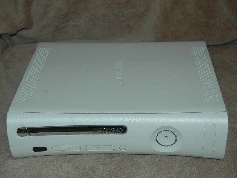 Xbox 360, wireless controller, x2 hard drives amp 5 games.