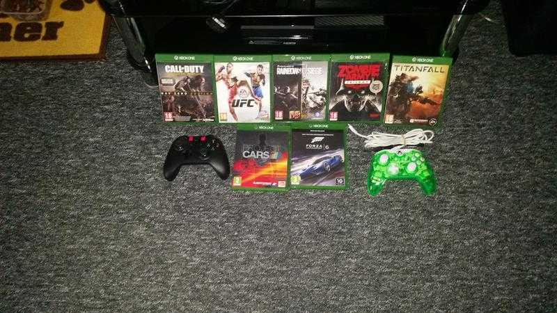 Xbox one plus 7 games boxed