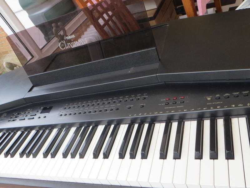 Yamaha Clavinova CVP-20 Action Effect Keyboard with piano stool. Weighted touch. 76 keys.