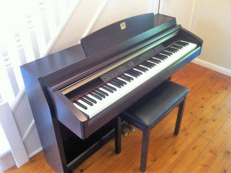 Yamaha Clavinova Digital Piano and Stool.