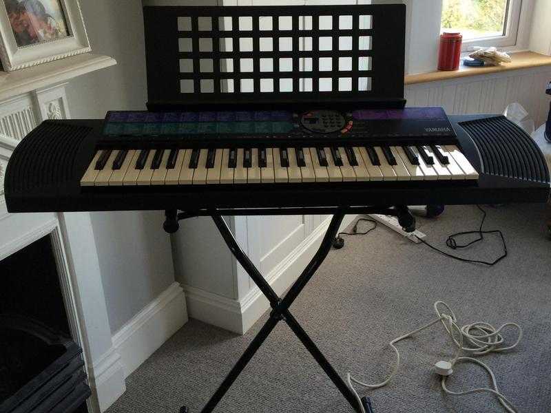 Yamaha keyboard and stand