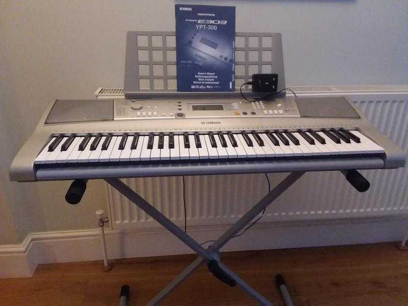 Yamaha PSR-E303 electronic keyboard with stand