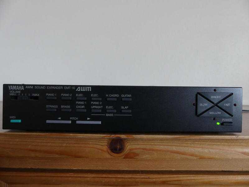 Yamaha Sound Expander EMT-10 complete with a Yamaha Power Adaptor as its power supply